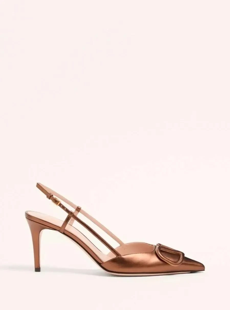 A low bronze slingback heel.